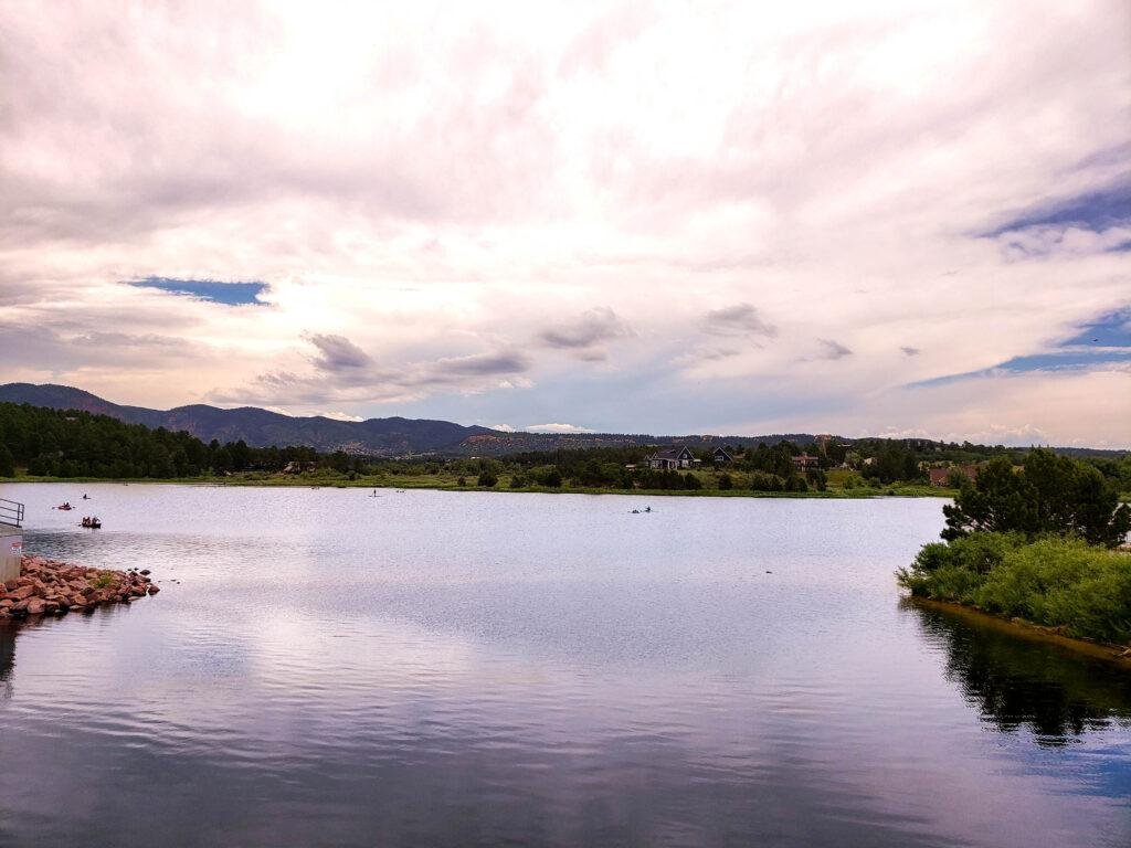 Monument Lake with the foothills beyond the town of Monument Colorado