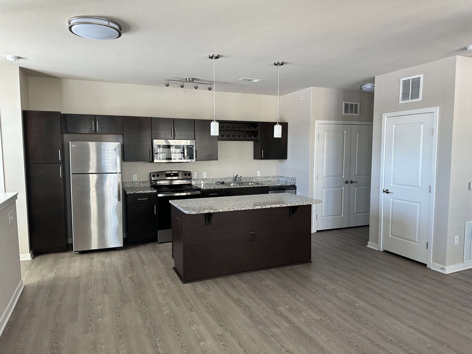 Apartment kitchen in a Monument rental community.
