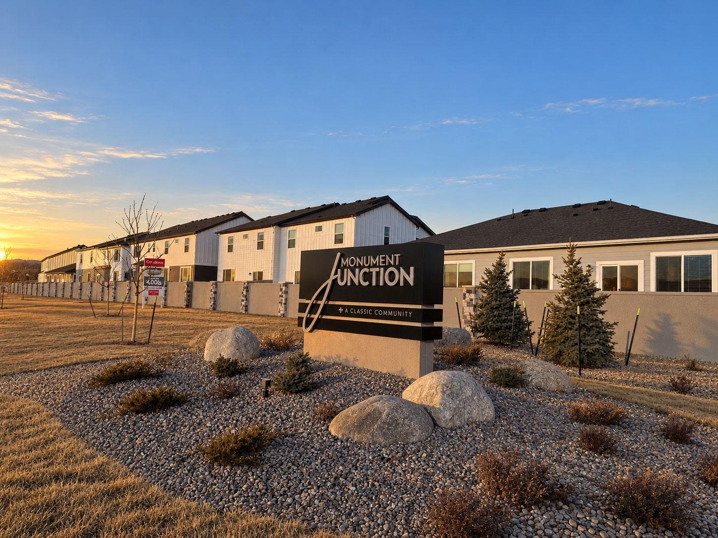 Monument Junction community entrance at golden hour in Monument Colorado
